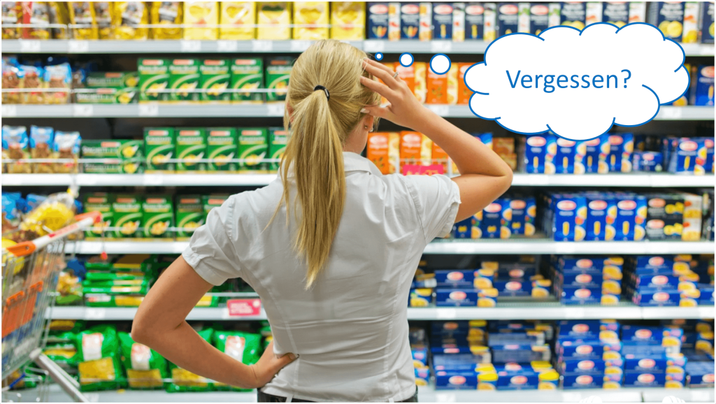 Woman in Supermarket Thinking, Standing in Front of a Shelf with Groceries.